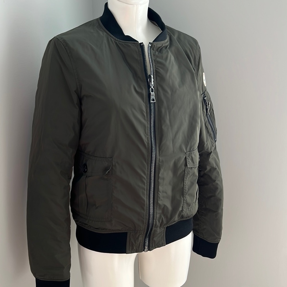 Reversible ski jacket. Gold X olive green. Size small.